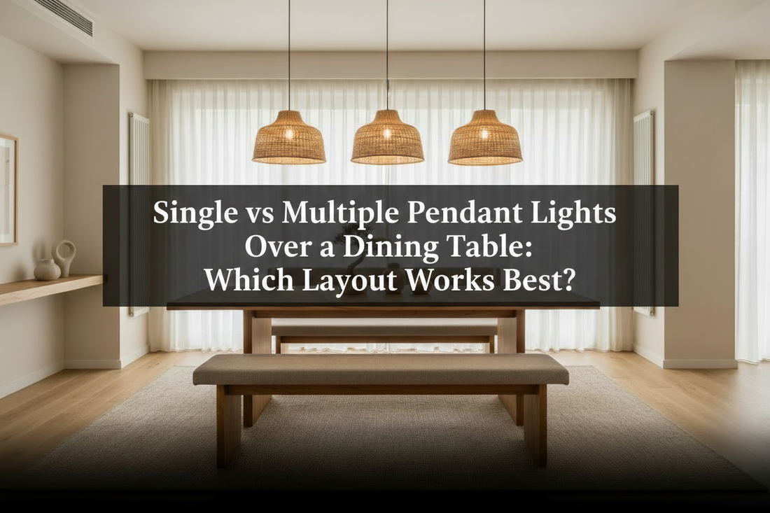 Three pendant lights hanging over a long wooden dining table in a modern Japandi dining room
