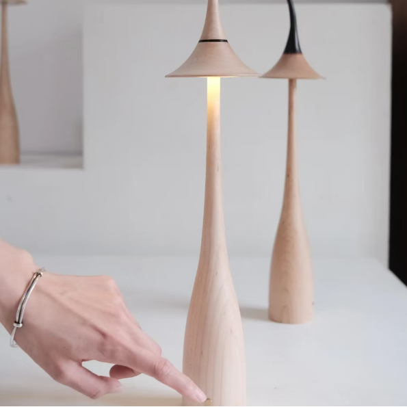 Modern lamp with a unique design on a white surface