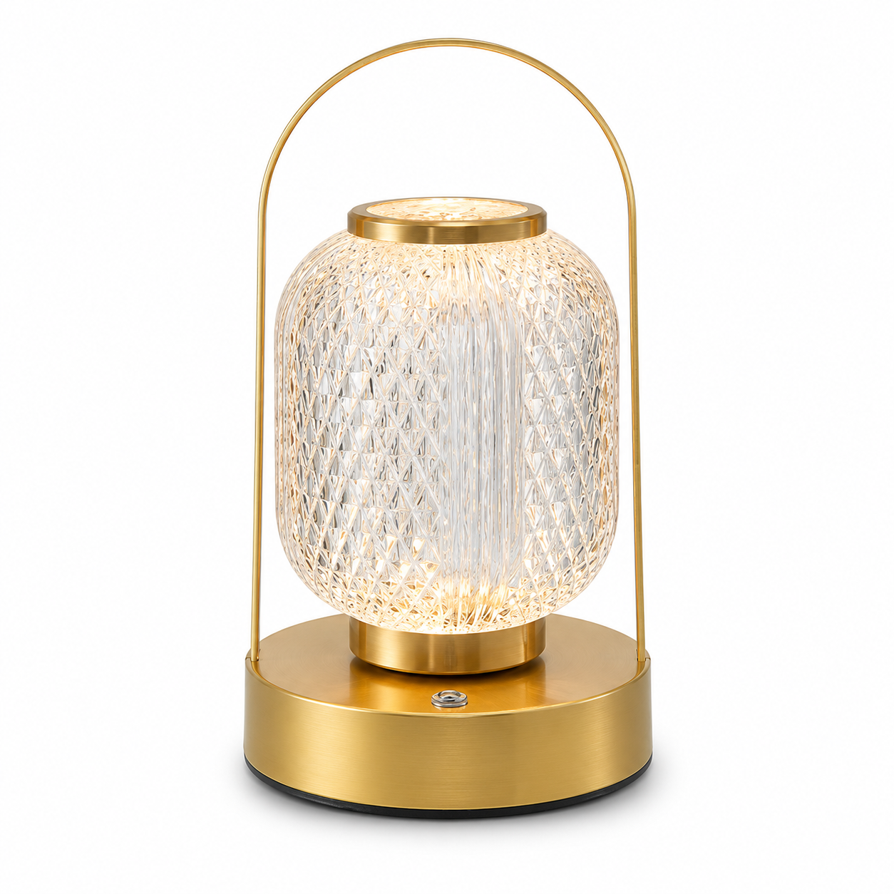 Gold table lamp with textured glass shade on a white background