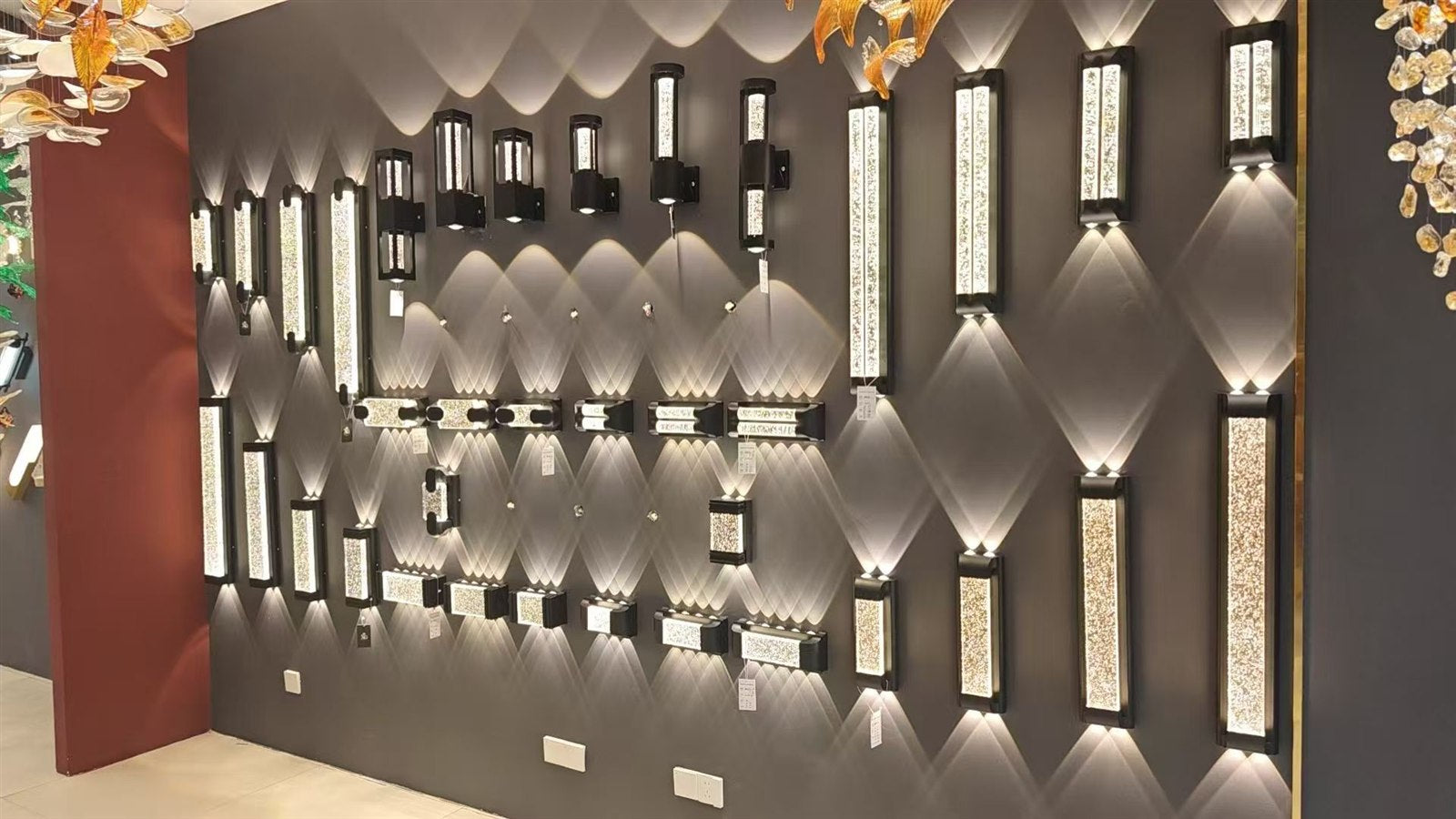 A showroom wall displaying illuminated wall lights