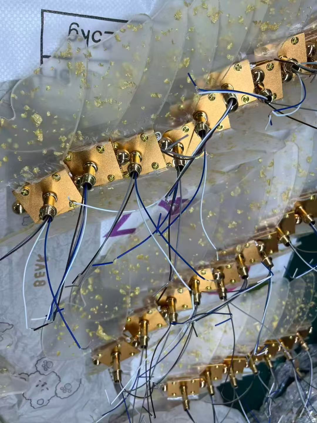 Gold electrical fittings and wiring prepared in batches